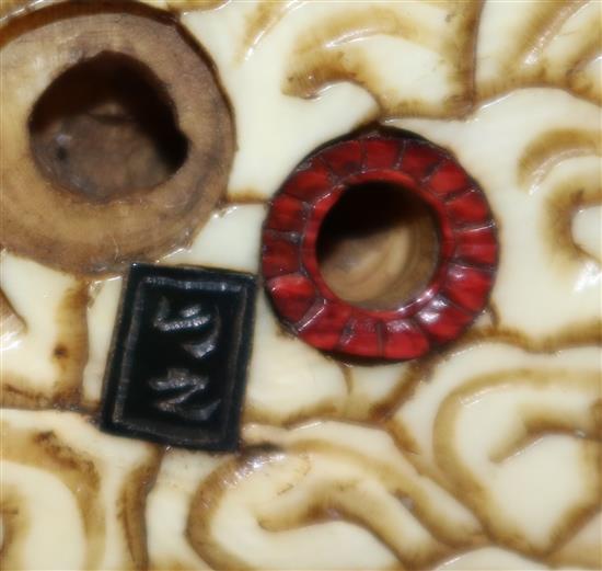 A Japanese ivory netsuke of multiple rakan, Meiji period, height 5.6cm